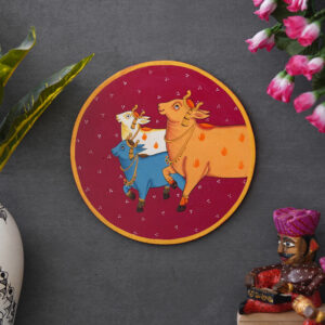 Crafted on a wooden plate, this pichwai portrays three cows in a circular formation.