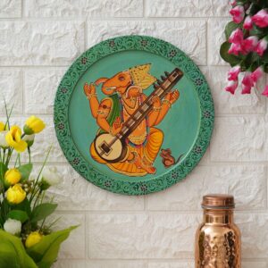 This beautiful pichwai painting features a majestic ganesh ji perched on a vibrant flowering branch.